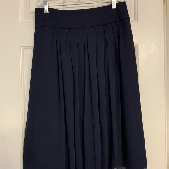 navy blue skirt and black top